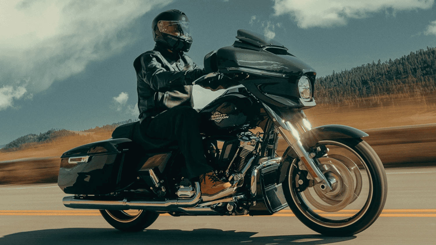 Iconic 2025 Harley-Davidson® Street Glide® touring motorcycle, highlighting its ergonomic build and advanced riding features for any road.